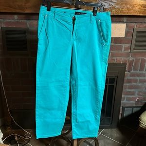 Ladies size 8 Nine West aqua colored denim capris.